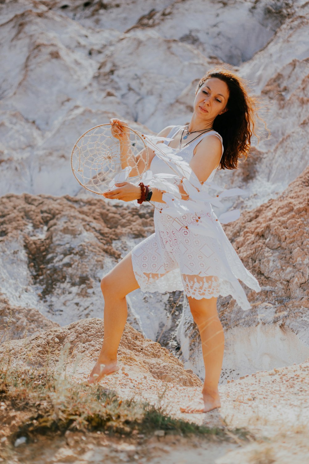 a woman holding a tennis racket