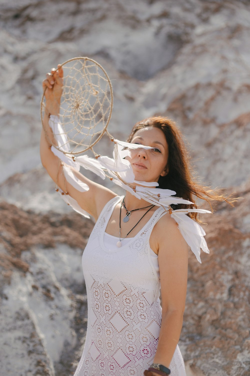 a woman wearing a white dress