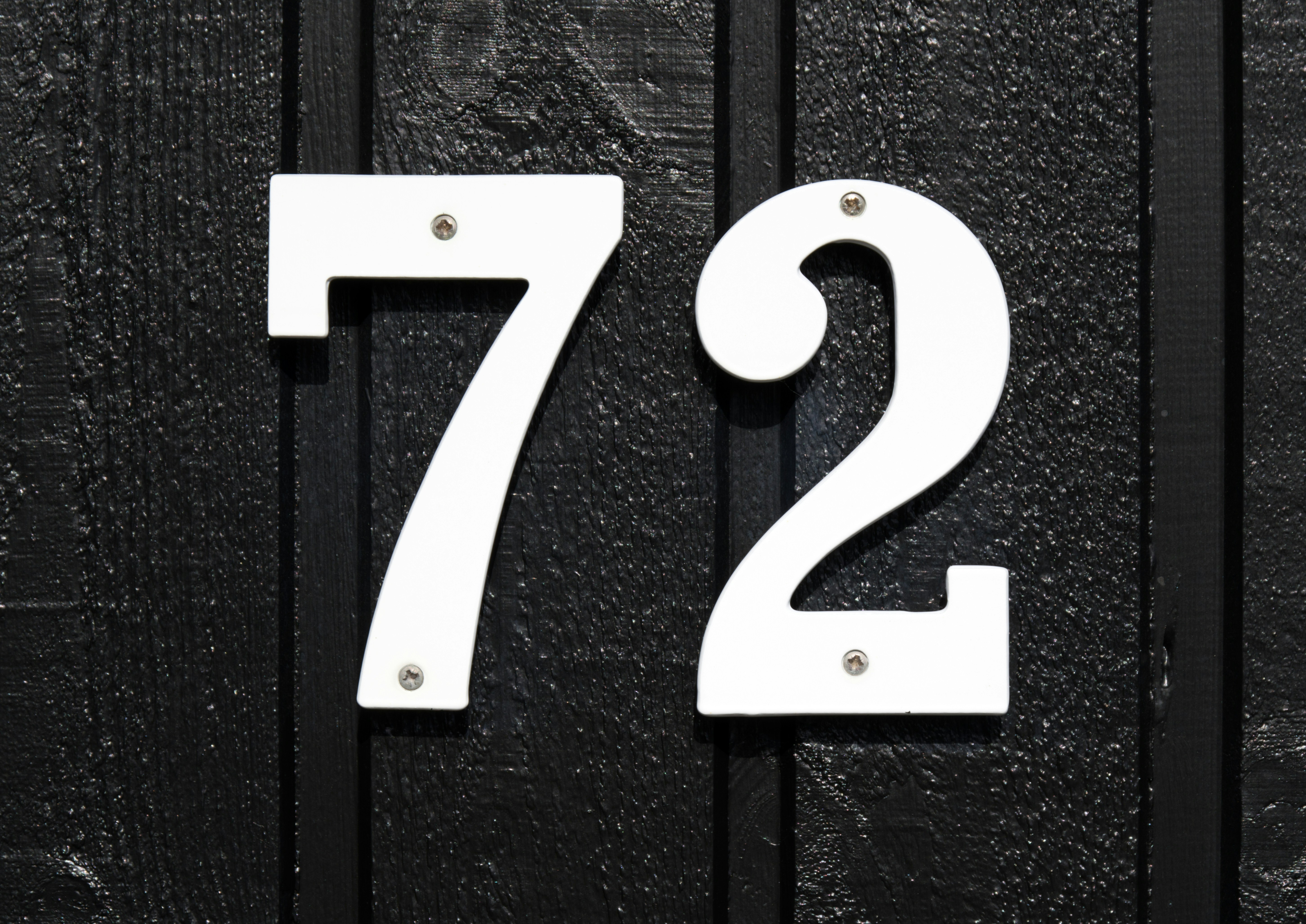 a number of white letters on a black surface