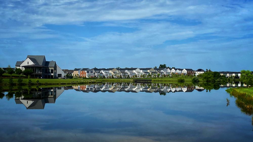 a body of water with houses along it