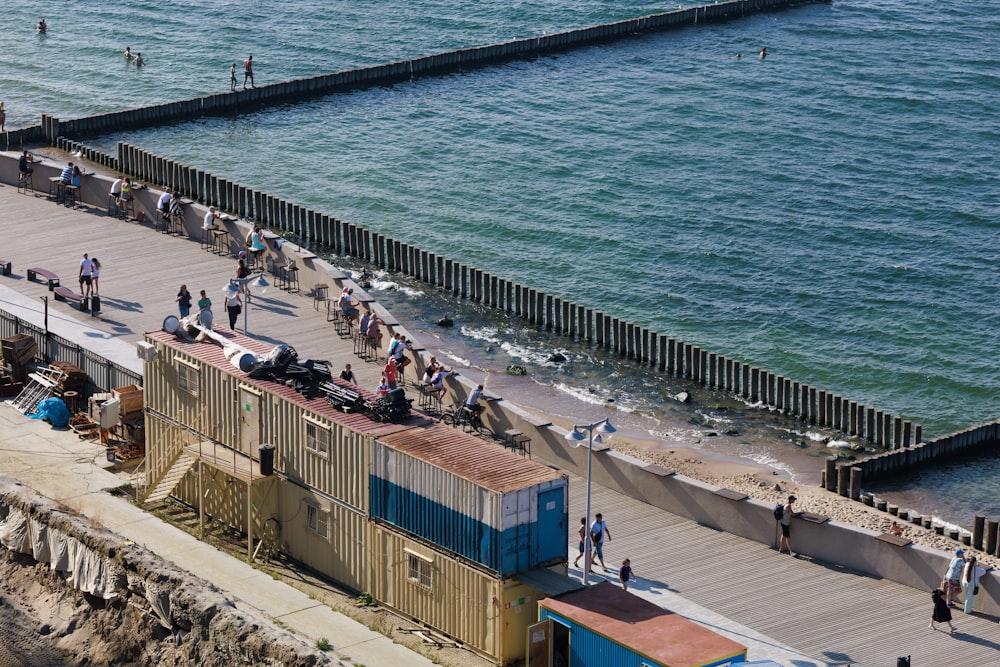 a group of people on a pier