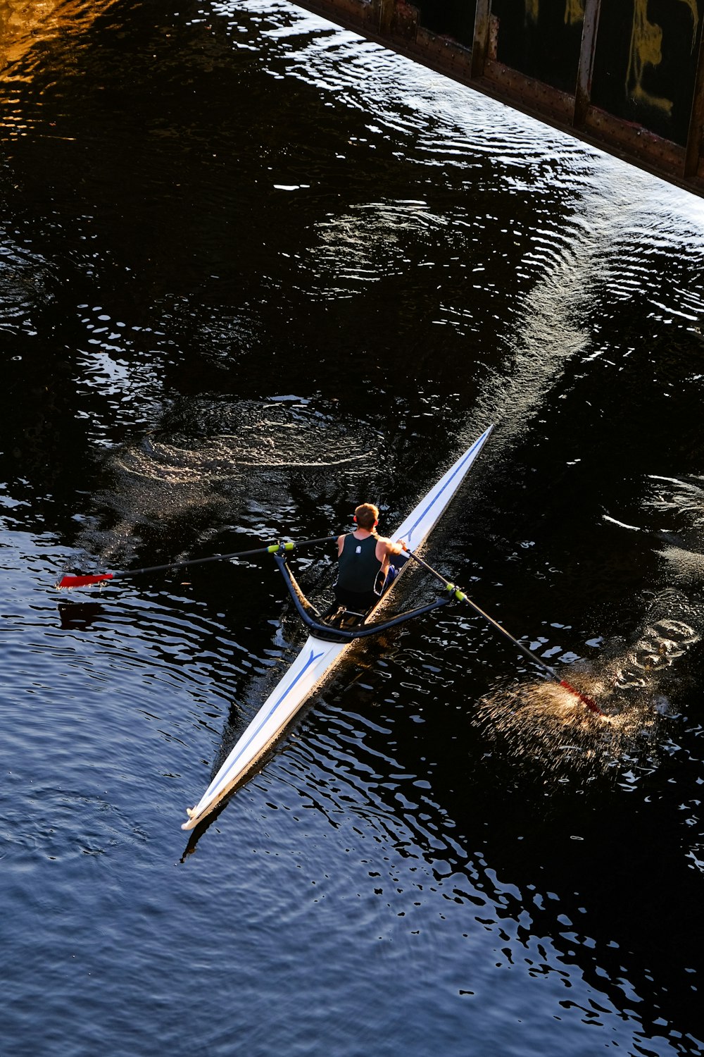 a man rowing a boat