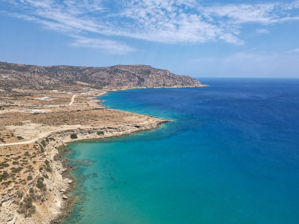 a beach with blue water