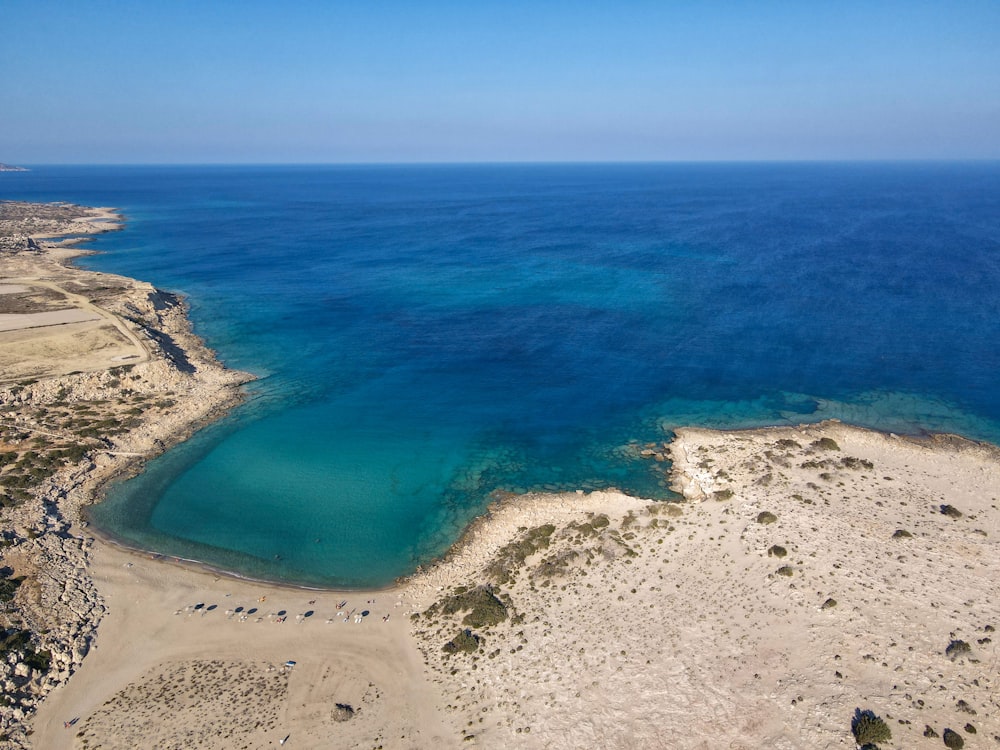 a beach with blue water