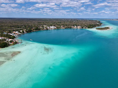 The Bacalar lagoon from above, its blues running from turquoise to deep green