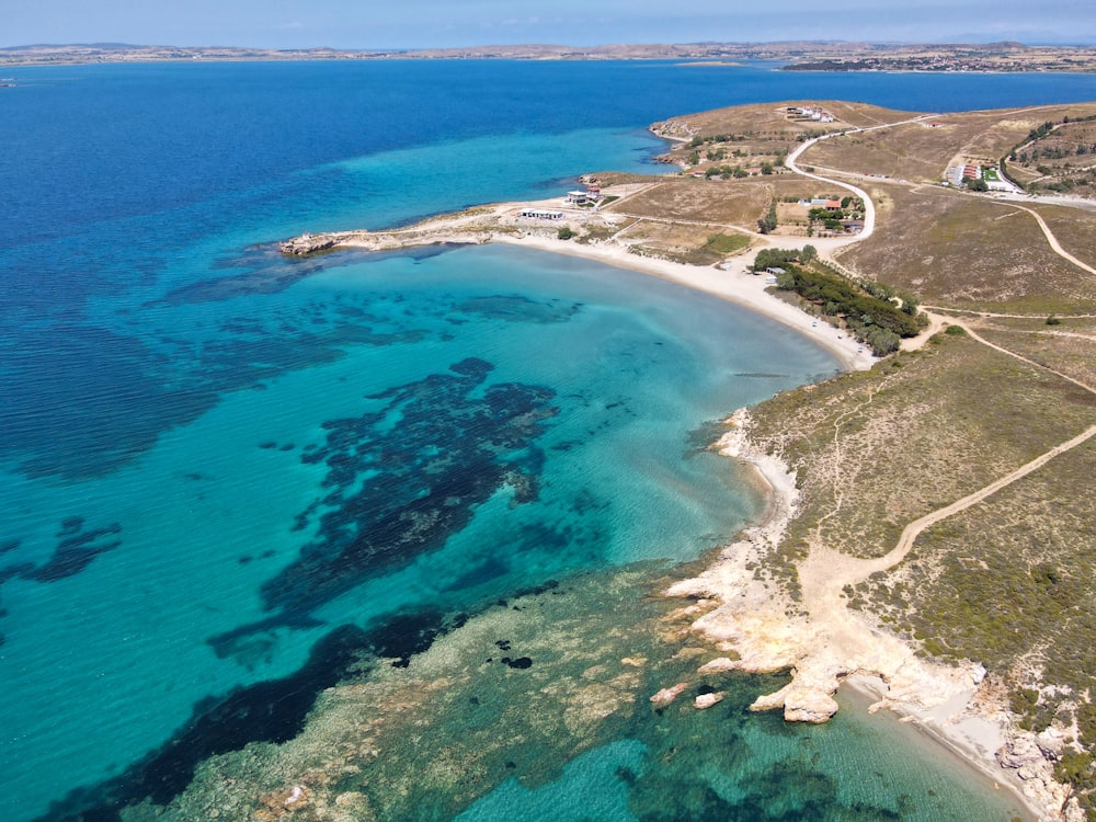 an aerial view of a beach and ocean