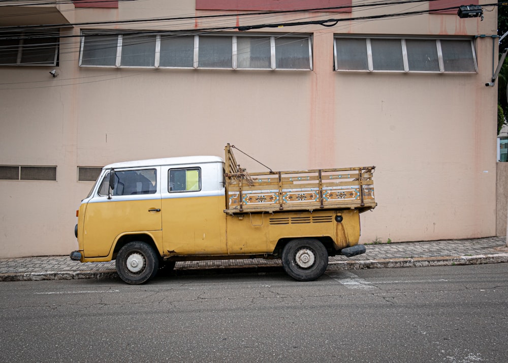 a yellow van with a trailer