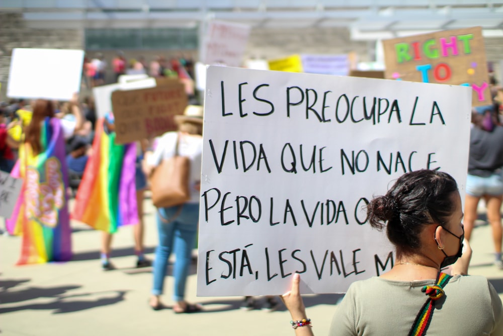 a person holding a sign