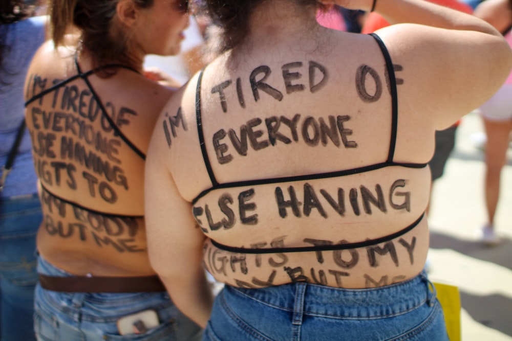 a person with tattoos on their back