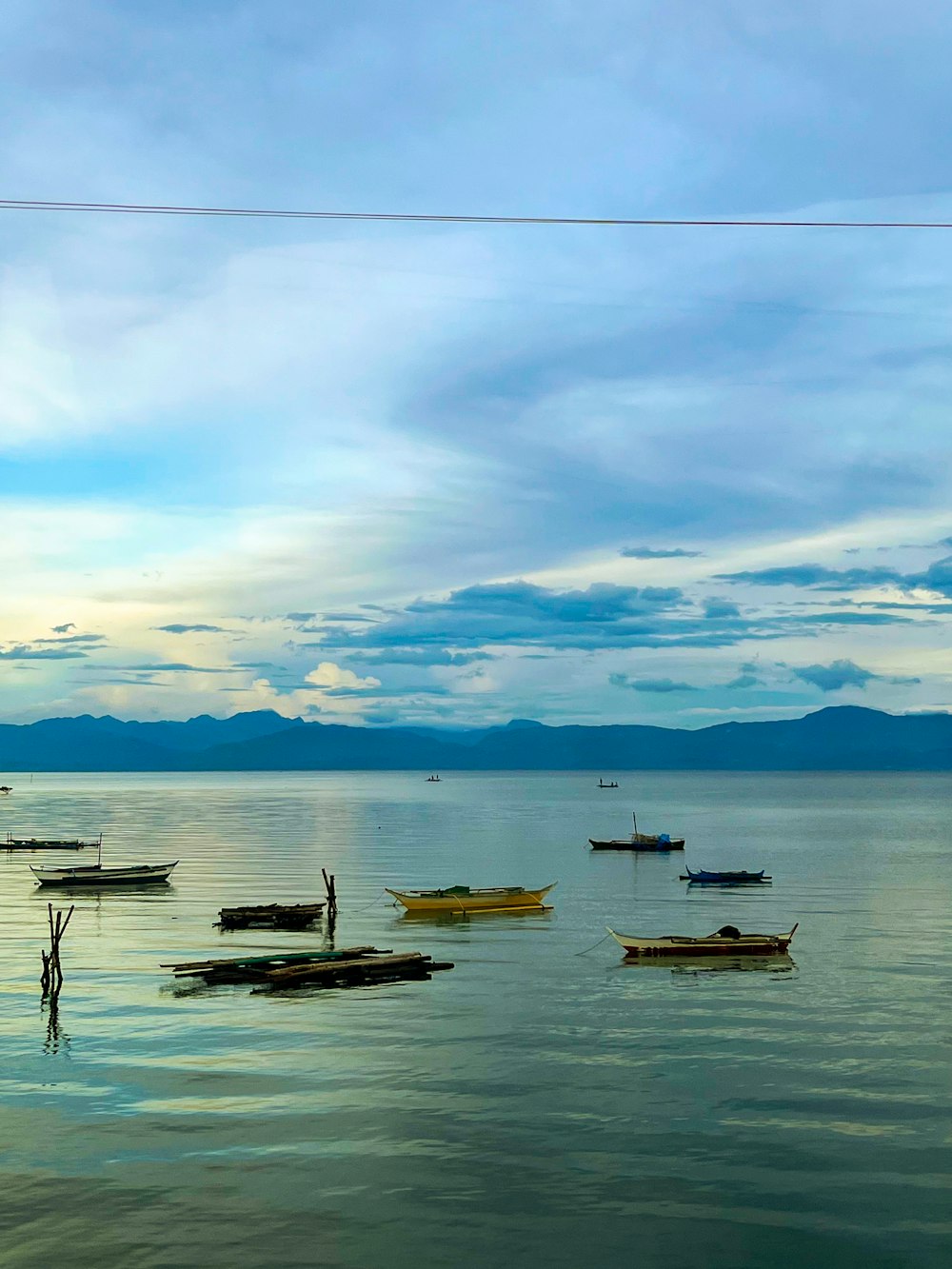 a group of boats in a body of water