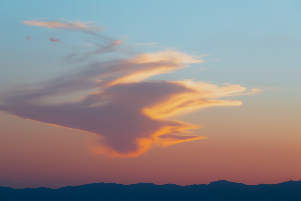 a colorful sky with clouds