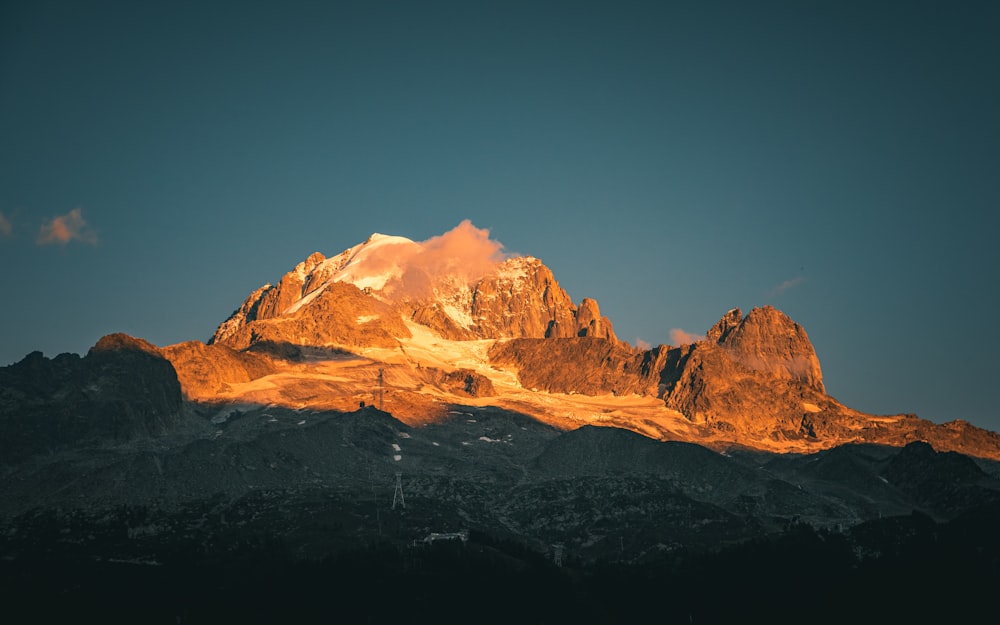 a mountain with snow