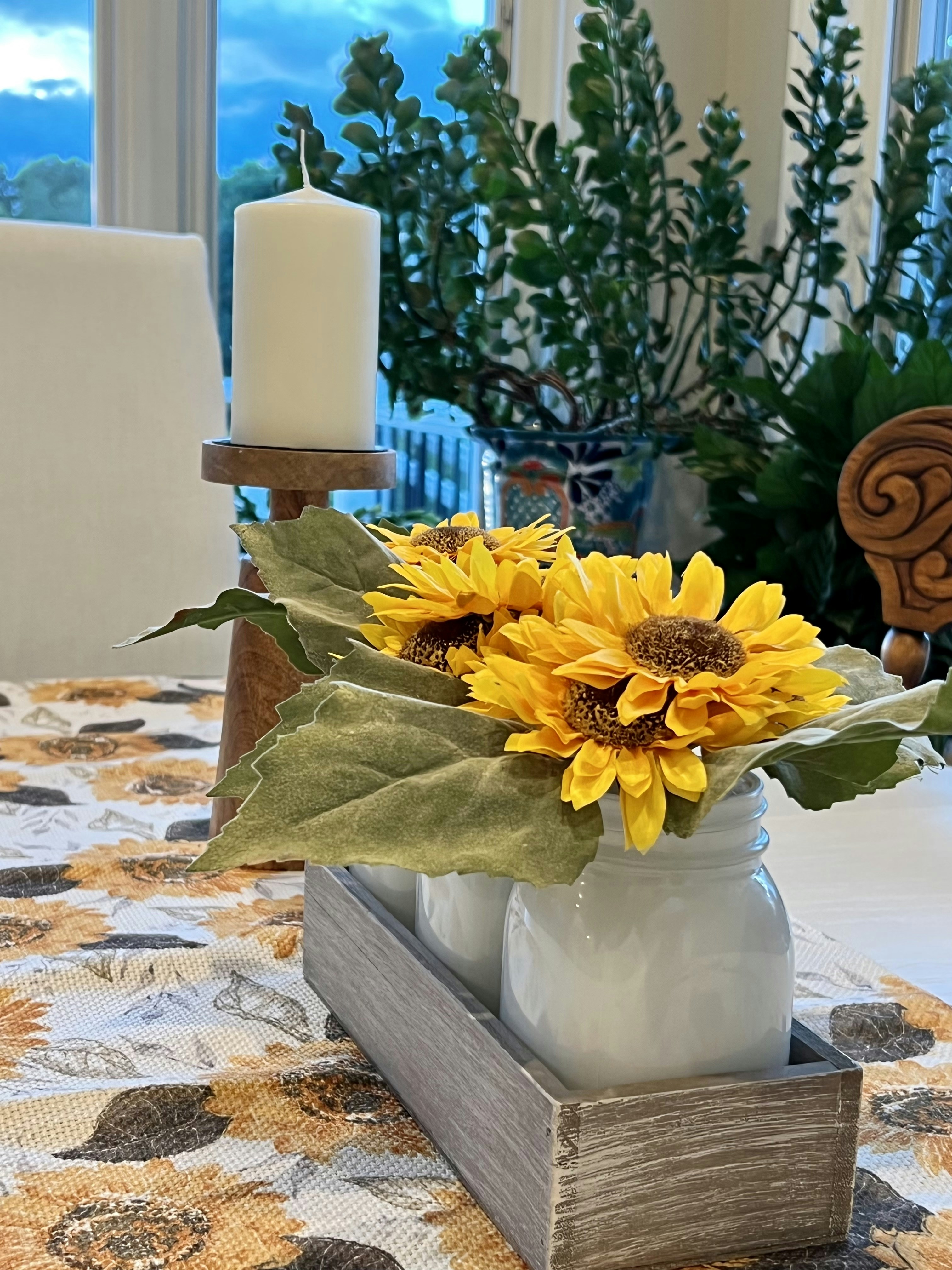 a vase with yellow flowers