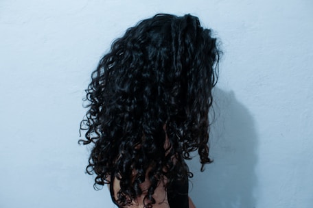 a person with the hair pulled back