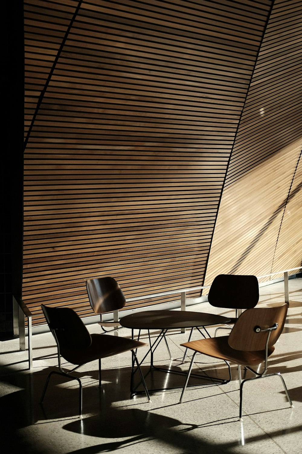 a group of tables and chairs