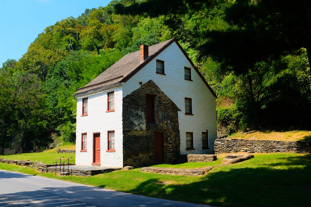 a white house with a red door