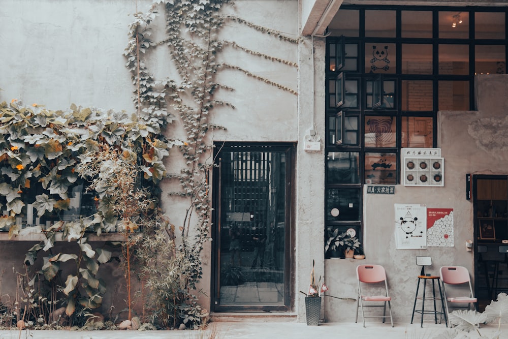 a building with chairs and tables outside