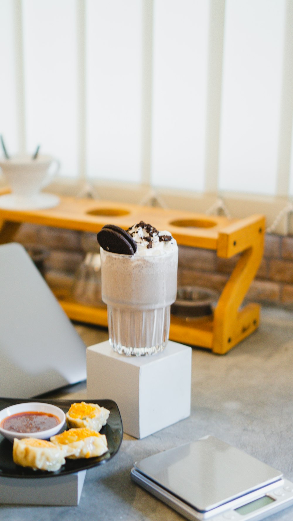 a table with food and a glass of milk