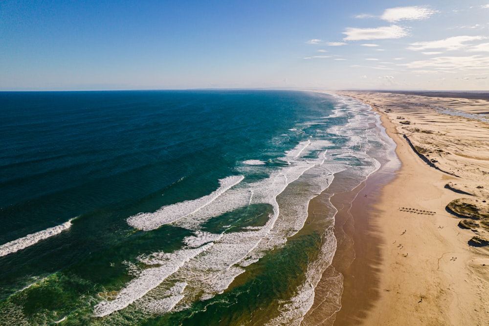 a beach with blue water