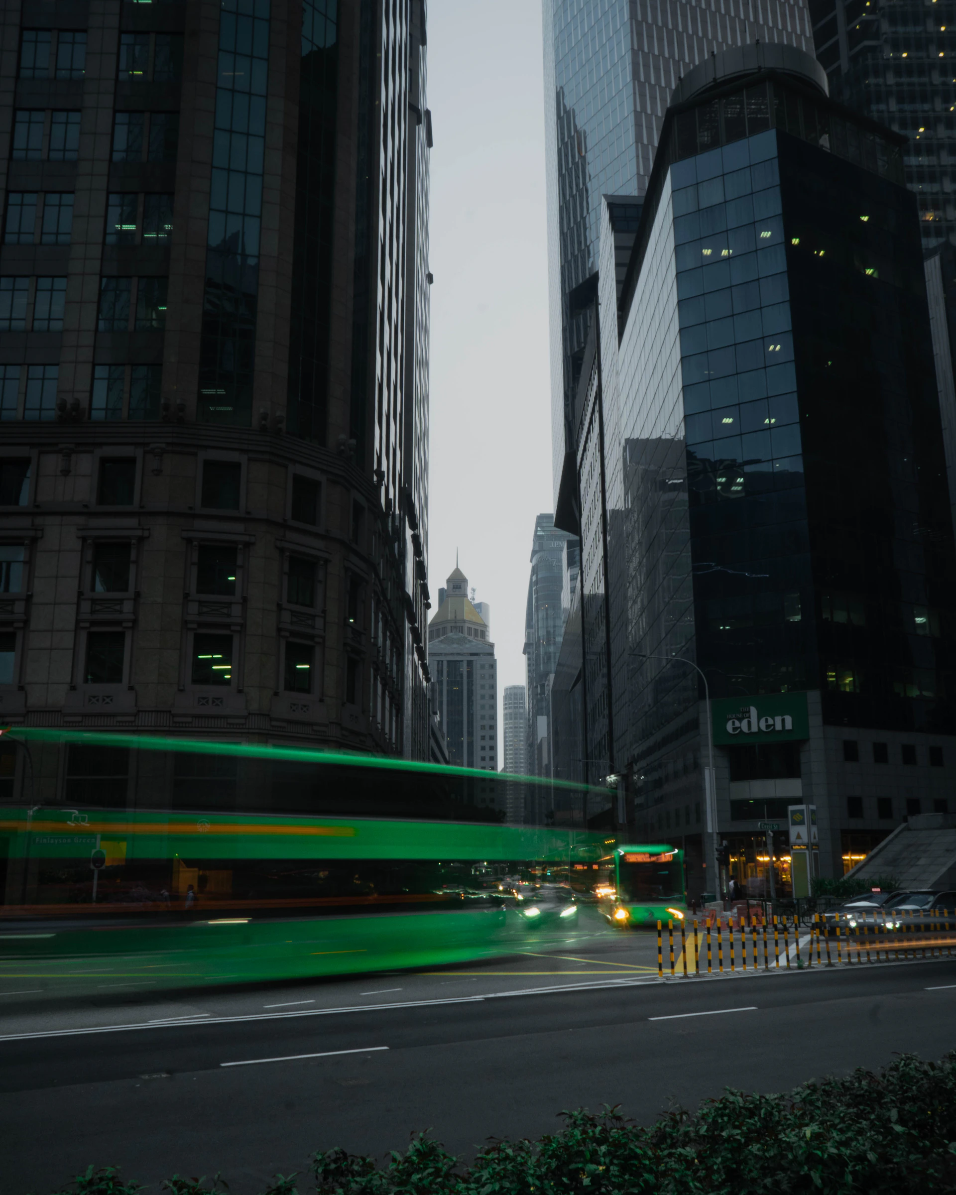 a city street with tall buildings