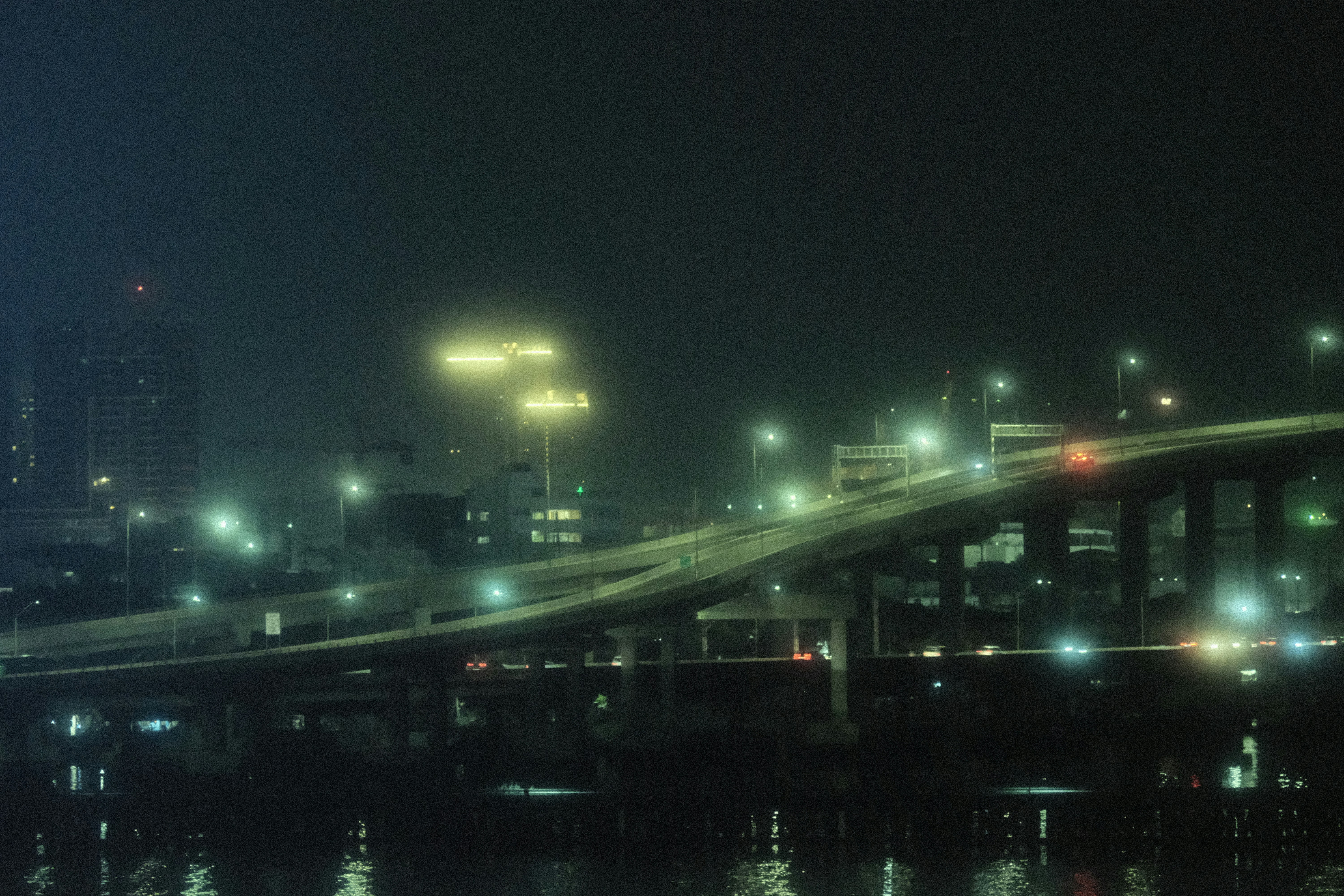 a bridge with lights at night