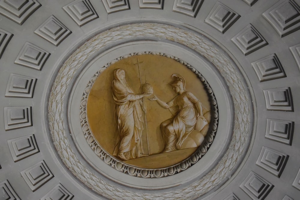 a gold coin on a wall