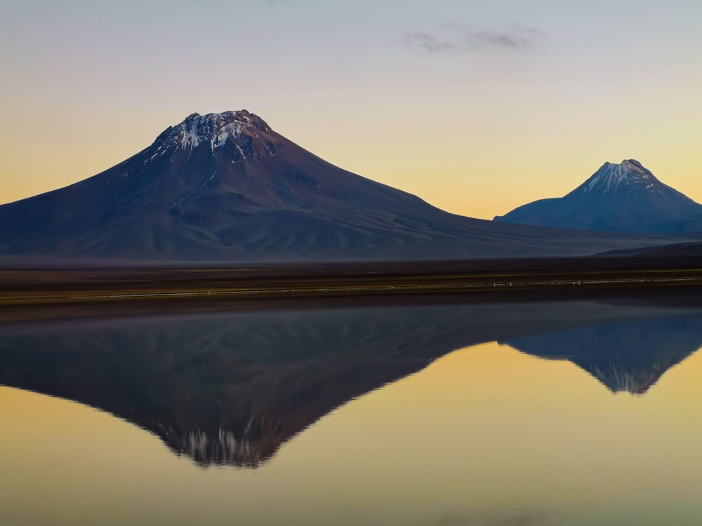 a mountain reflected in a lake