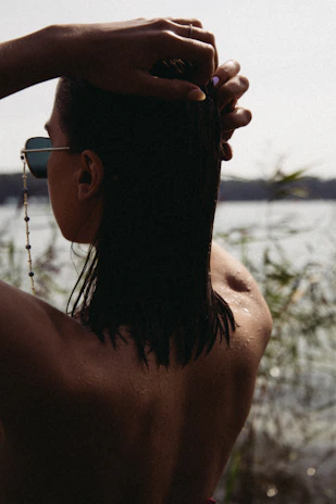 a person with the hair tied to the head