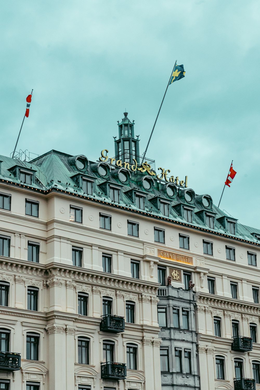 a building with flags on top