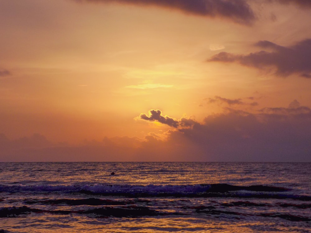 a sunset over the ocean