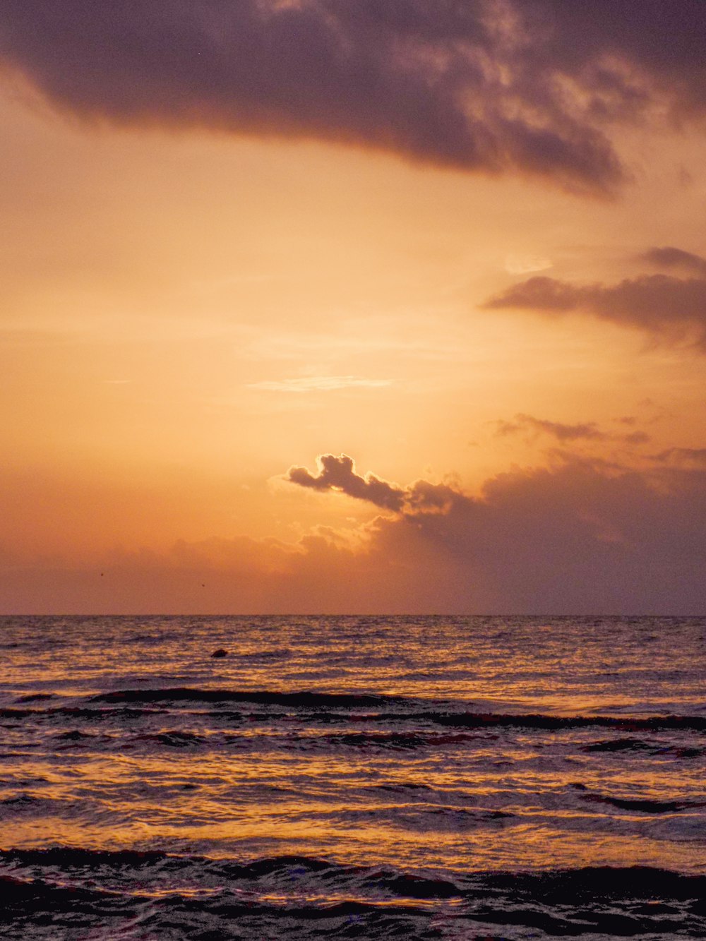 a sunset over the ocean