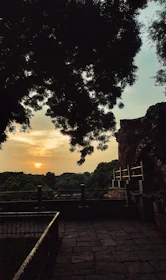 A peaceful view of the Santuario de Las Lajas at sunset with warm light.