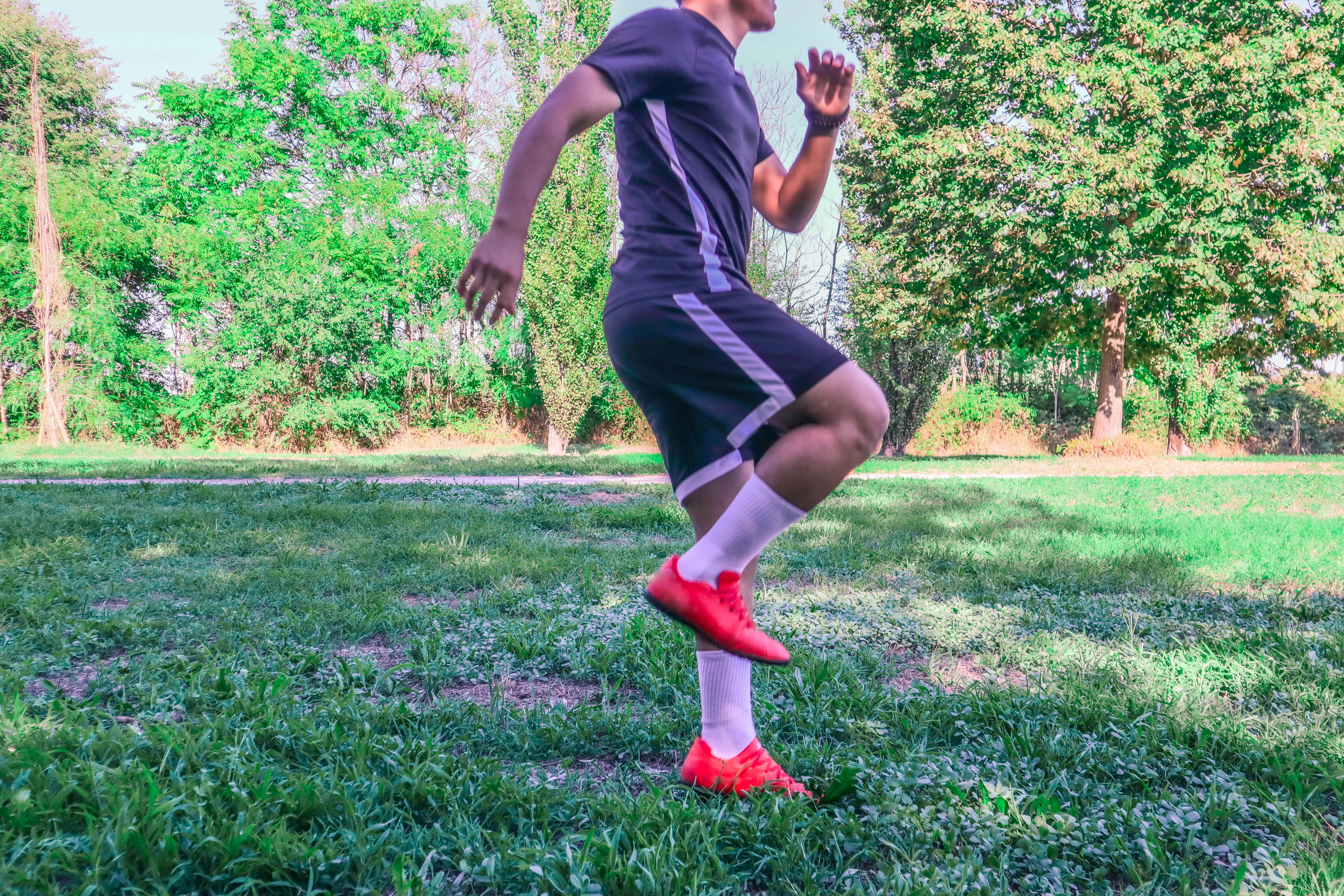 a person running on grass