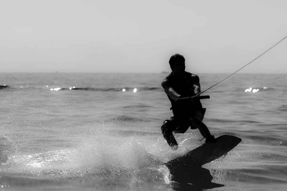 a man surfing on the sea