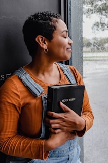 a man holding a book