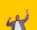 a man holding his hands up