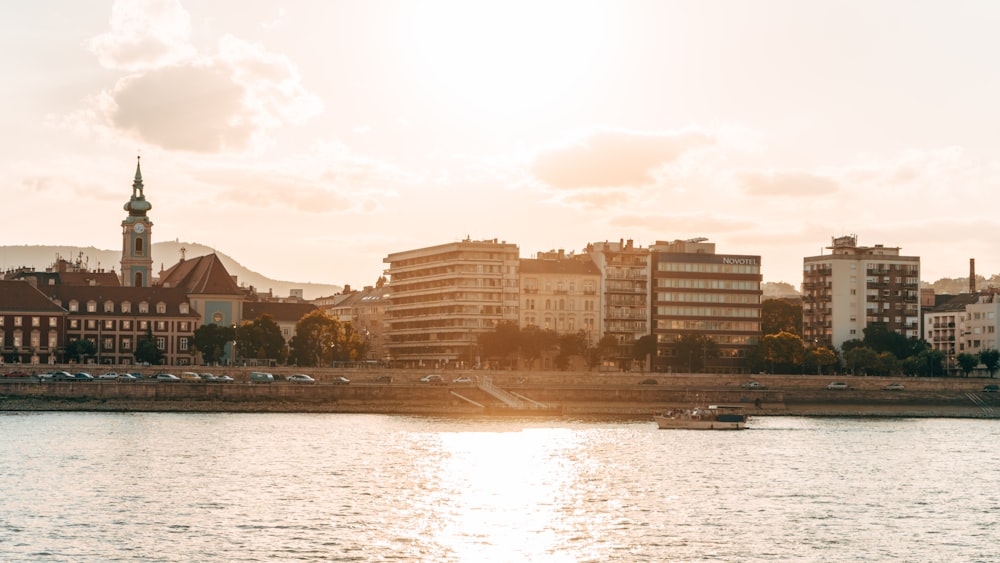 a body of water with buildings along it