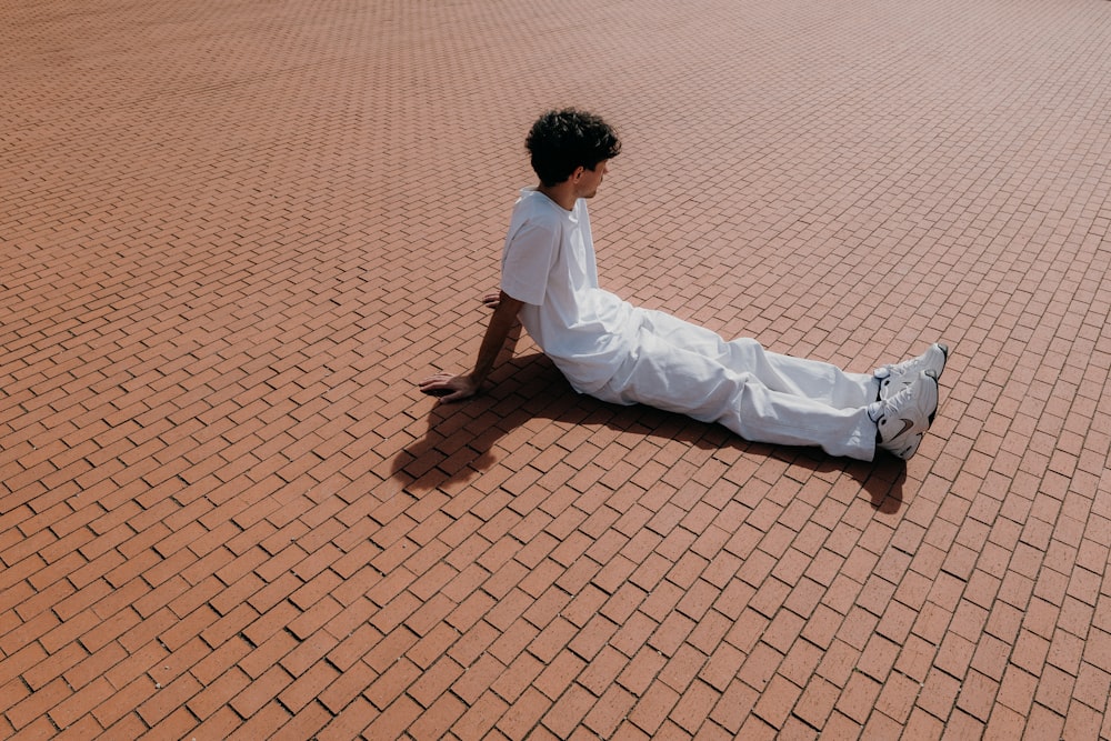 a man sitting on the ground