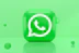 A green 3D icon of a telephone handset inside a speech bubble