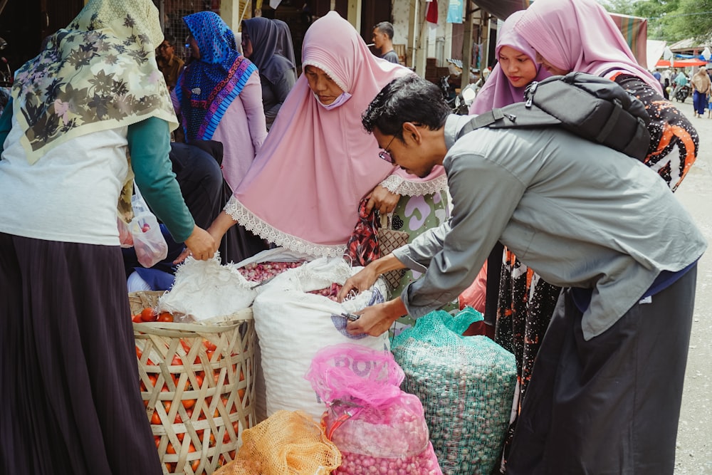 a group of women at a market