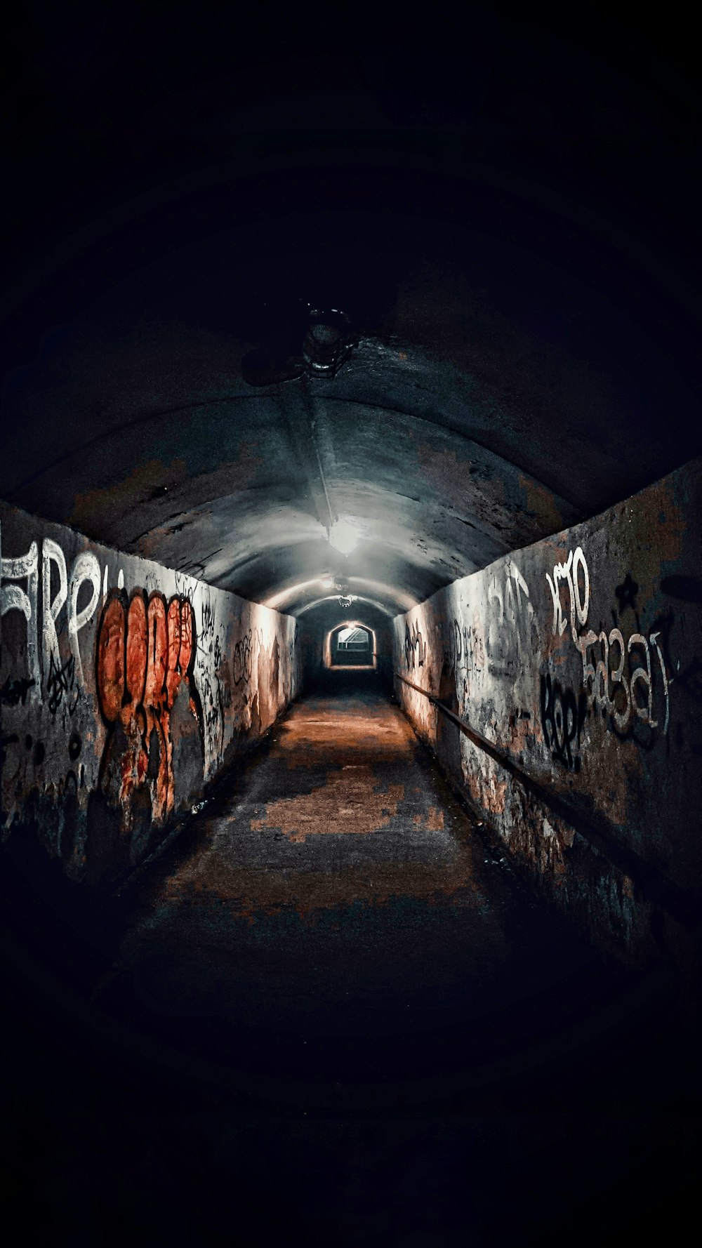 a tunnel with a light at the end