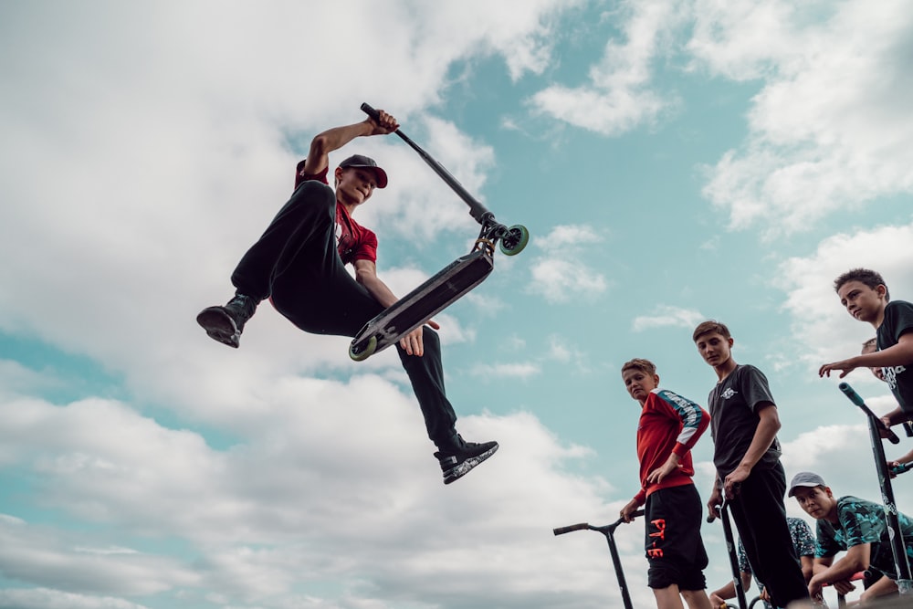 a man jumping with a skateboard