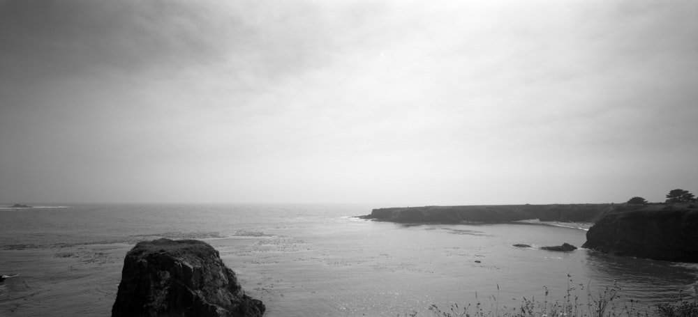 a body of water with rocks in it