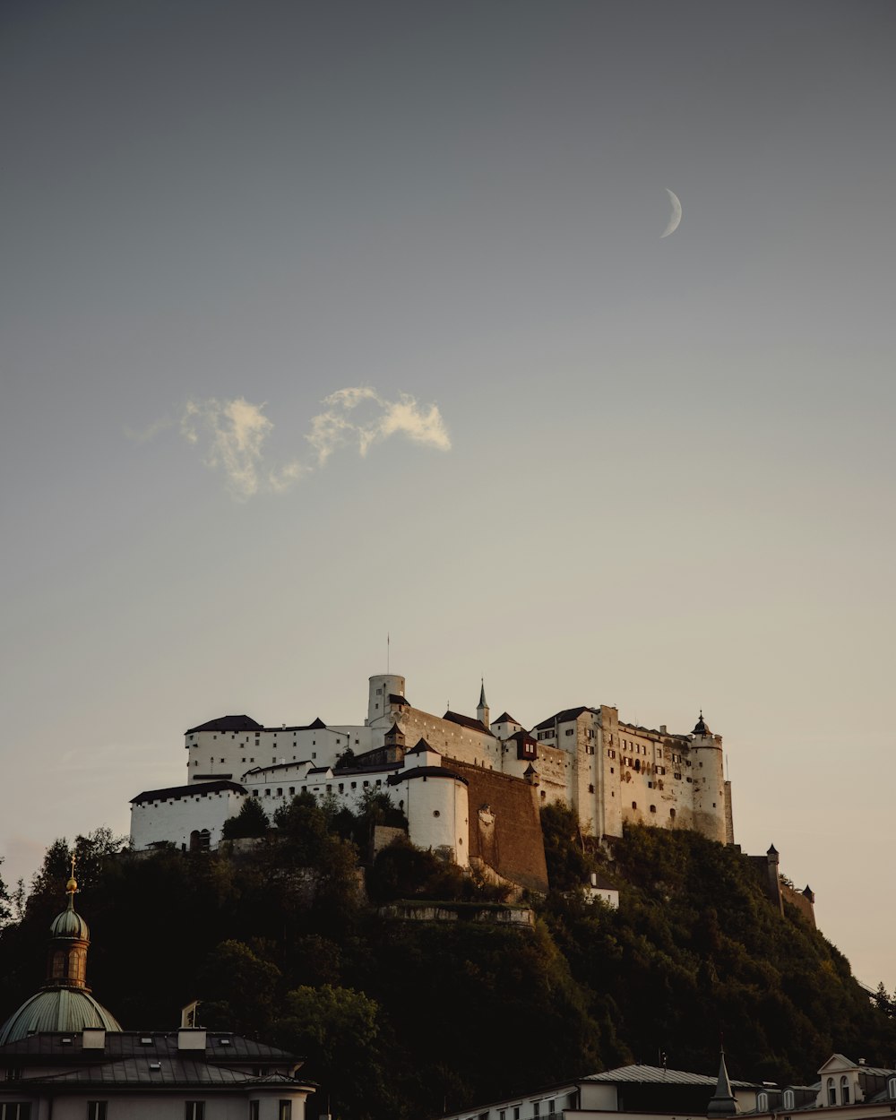 a large building on a hill