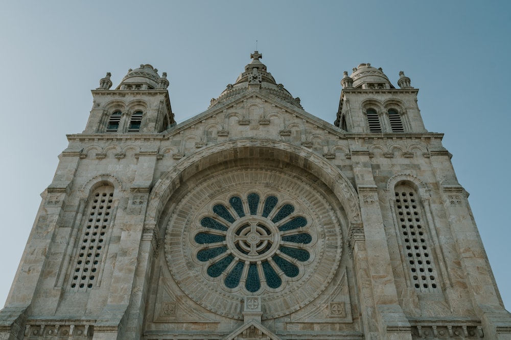 a large stone building with a clock