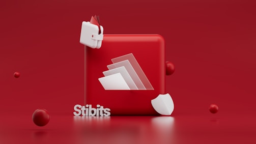 A red background is the setting for a 3D composition consisting of a red cube with a folded paper effect on its surface. Surrounding the cube are smaller spheres and a white shield-like shape. Additionally, a small, abstract white and red object resembling a wallet is present. The word 'Stibits' appears prominently in white letters at the bottom left.