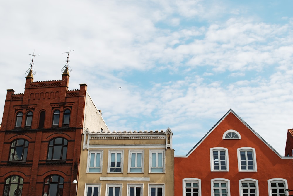 a group of buildings with a blue sky