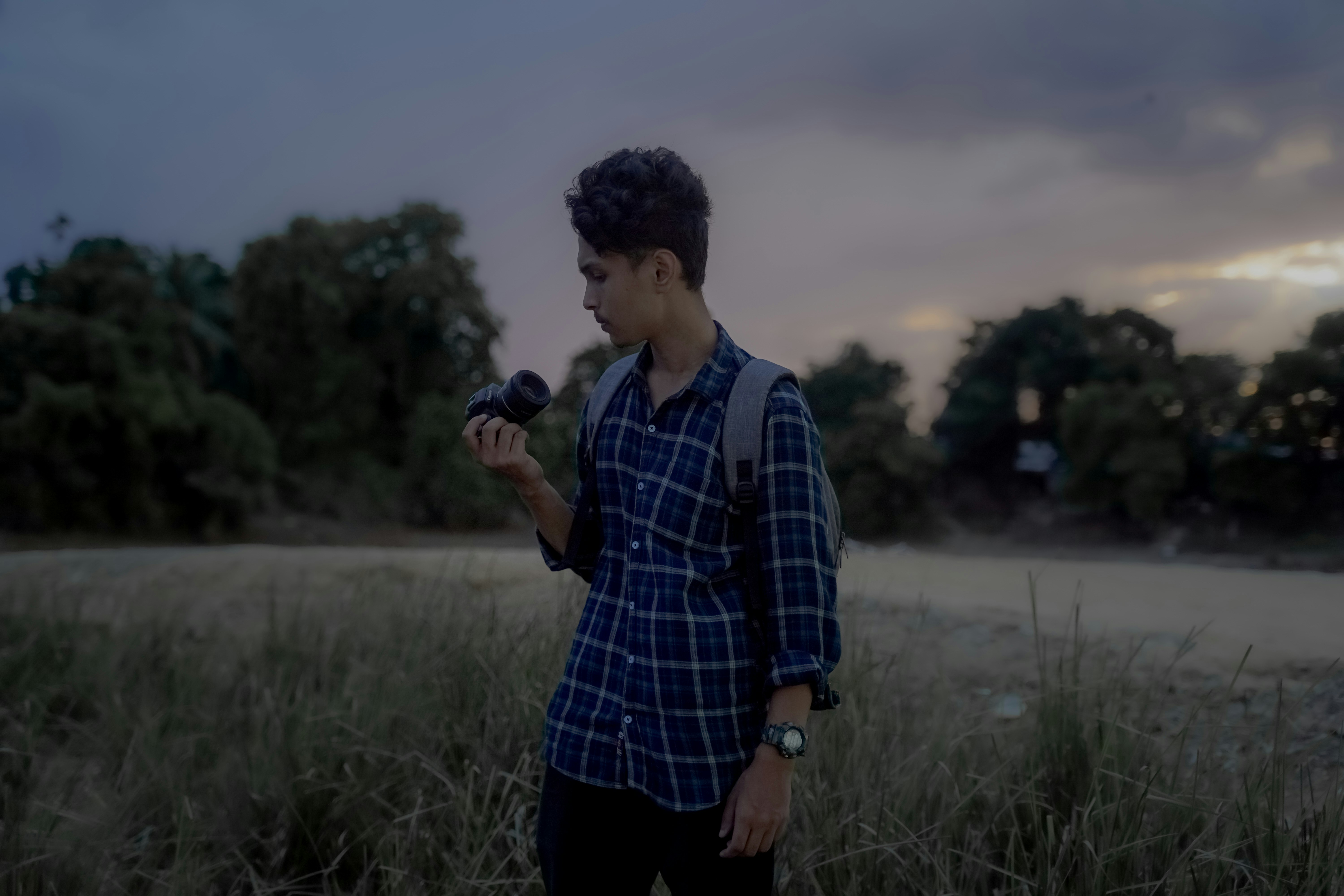 a man holding a camera