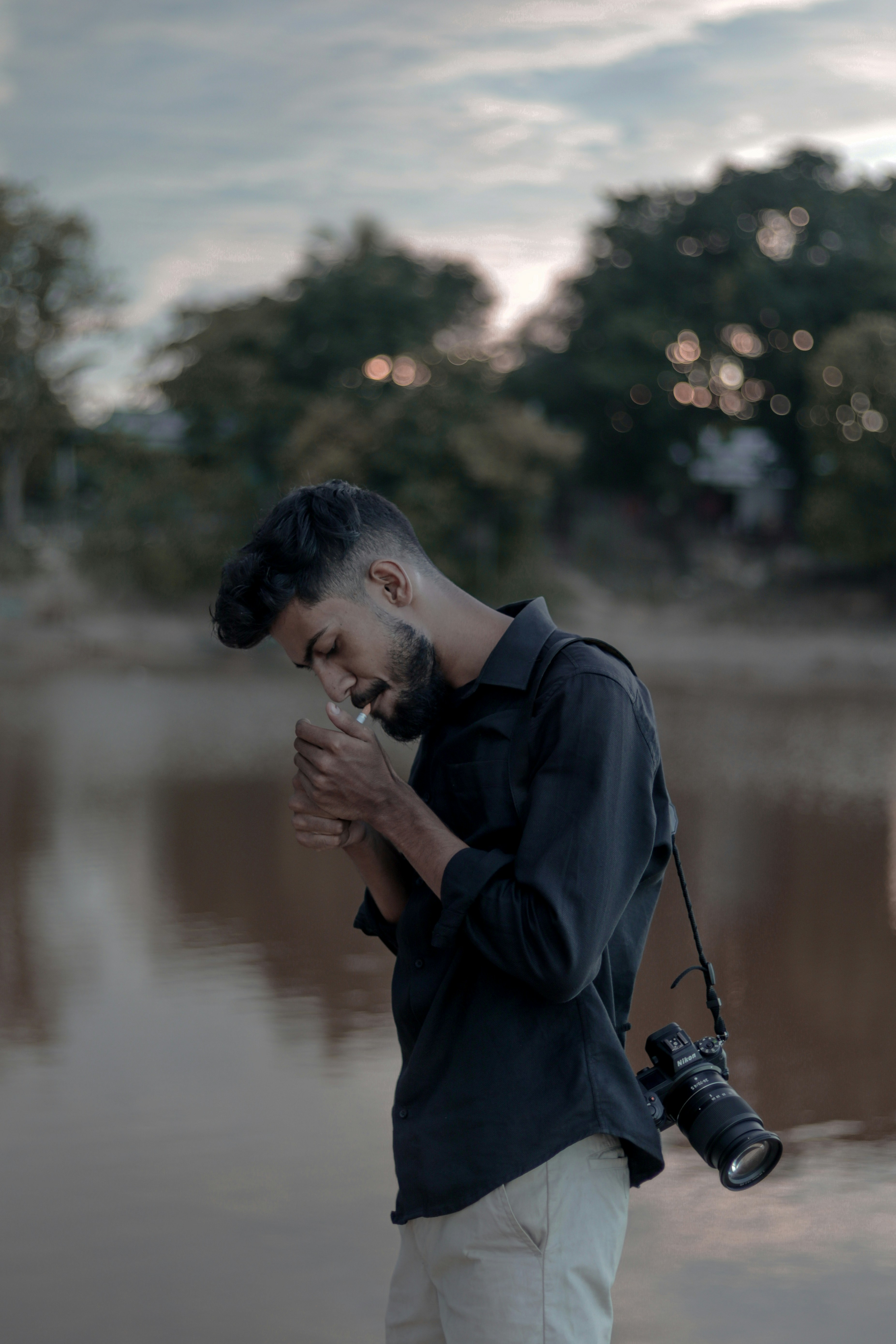 a man smoking a cigarette