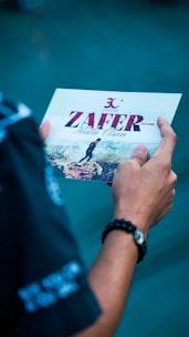 a person holding a card